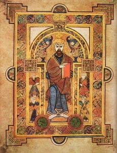 <i>Christ Enthroned</i> from <i>The Book of Kells</i> (c. 800) shows the bright color, gold framing of the composition, and intricate patterning from the Celtic tradition, that characterized the illuminated manuscripts of the era.