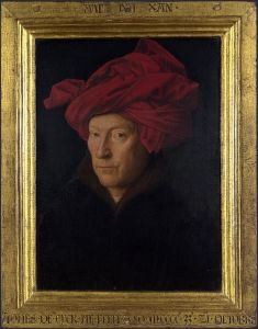 Jan van Eyck's <i>Portrait of a Man</i> (1433), known commonly as <i>Portrait of a Man in a Red Turban</i>, is believed to be his self-portrait and the first instance of self-portraiture in oil. His motto is inscribed at the top of the frame, which he also made, saying the image is “United with its frame.”