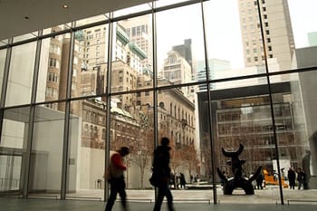 O'Hara began his career at New York's, MoMA (contemporary photograph of museum shown here), working at the front desk before being promoted to the role of Associate Curator.