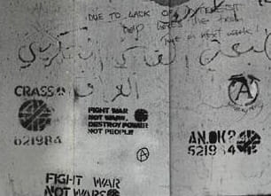 Front cover for the Crass album, <i>Stations of the Crass</i> featuring some of the band's stencil graffiti in the London Underground system.