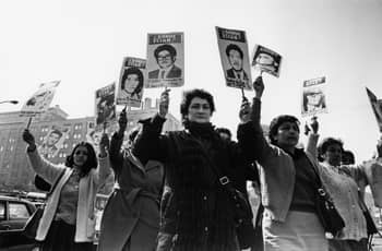 Much of Salcedo's art is inspired by conversations she has had with family members of disappeared individuals in Colombia and beyond. This is a photograph by Kena Lorenzini of women protesting forced disappearances in Santiago, Chile.