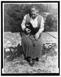 Portrait of Gertrude Stein with her dog Pepe (1934).