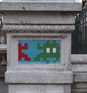 Tiles installed by the artist Space Invader, at the Square Émile-Chautemps in Paris
