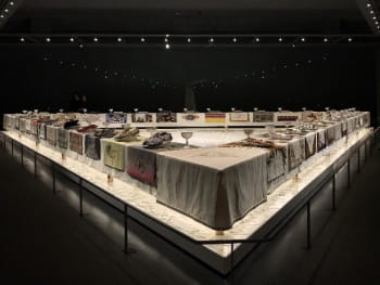 Judy Chicago's <i>The Dinner Party</i> (1974-79) contains place settings representing 39 women, including artists, and historical and mythological figures. The place settings include fabric, pottery and cutlery - all items allocated to the domestic sphere - in a grand celebration of women's contributions to society and history.