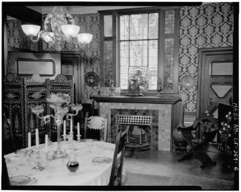 The Dining Room at the Mark Twain House. The wall paper and ceiling was stenciled by Tiffany and others in the Associated American Artists group.