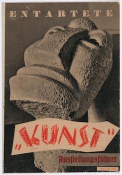 The cover of the guide to the Degenerate Art exhibition featured, <i>Der Neue Mensch</i> (<i>The New Human) </i>(1912), a Primitive sculpture by Otto Freundlich. The work was later destroyed, and Freundlich dispatched to a concentration camp where he died in 1943.