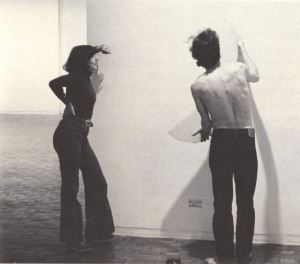 Richard Tuttle and curator Marcia Tucker installing Tuttle's work for the 1975 exhibition at the Whitney Museum of American Art