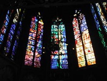 At the St. Stephen Cathedral in Metz Villon used a glass etching process that was basically the same as that used in the metal plates process for printmaking. The result produced a fine transparent color veneer on a clear glass base.