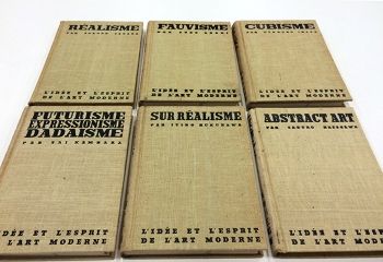 This photograph depicts the six volumes of the 1937 <i>Kindai bijutsu shichō kōza</i> = <i>Lʹidée et lʹesprit de lʹart moderne</i> (The Idea and Spirit of Modern Art), with essays written by various Japanese artists and lithographs that explore the various art movements.