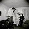 A Jewish Giant at home with his parents, in the Bronx, N.Y. (1970)