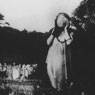 Self-Portrait with Masked Face and Graveyard (c.1947)