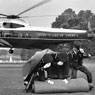 Untitled (Guards rolling up carpet after Nixon) (1974)