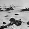 Robert Capa: FRANCE. Normandy. June 6th, 1944. US troops assault Omaha Beach during the D-Day landings (first assault) (1944)