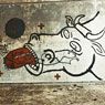 Gagging Cow at Pier (1983)