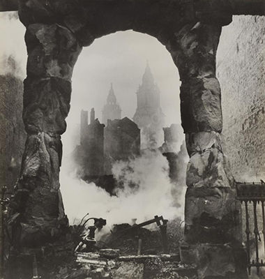 The western bell towers of St. Paul's Cathedral in London seen through an archway after the heavy incendiary raid of 29 December 1940 (1940)